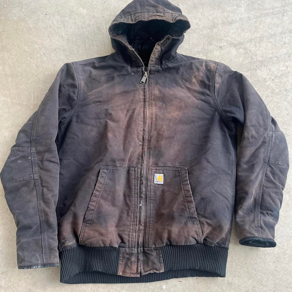Sun faded and distressed vintage Carhartt Jacket size L